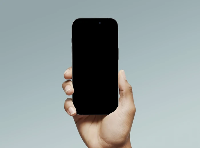 Free Realistic iPhone 16 Pro in Hand Mockup